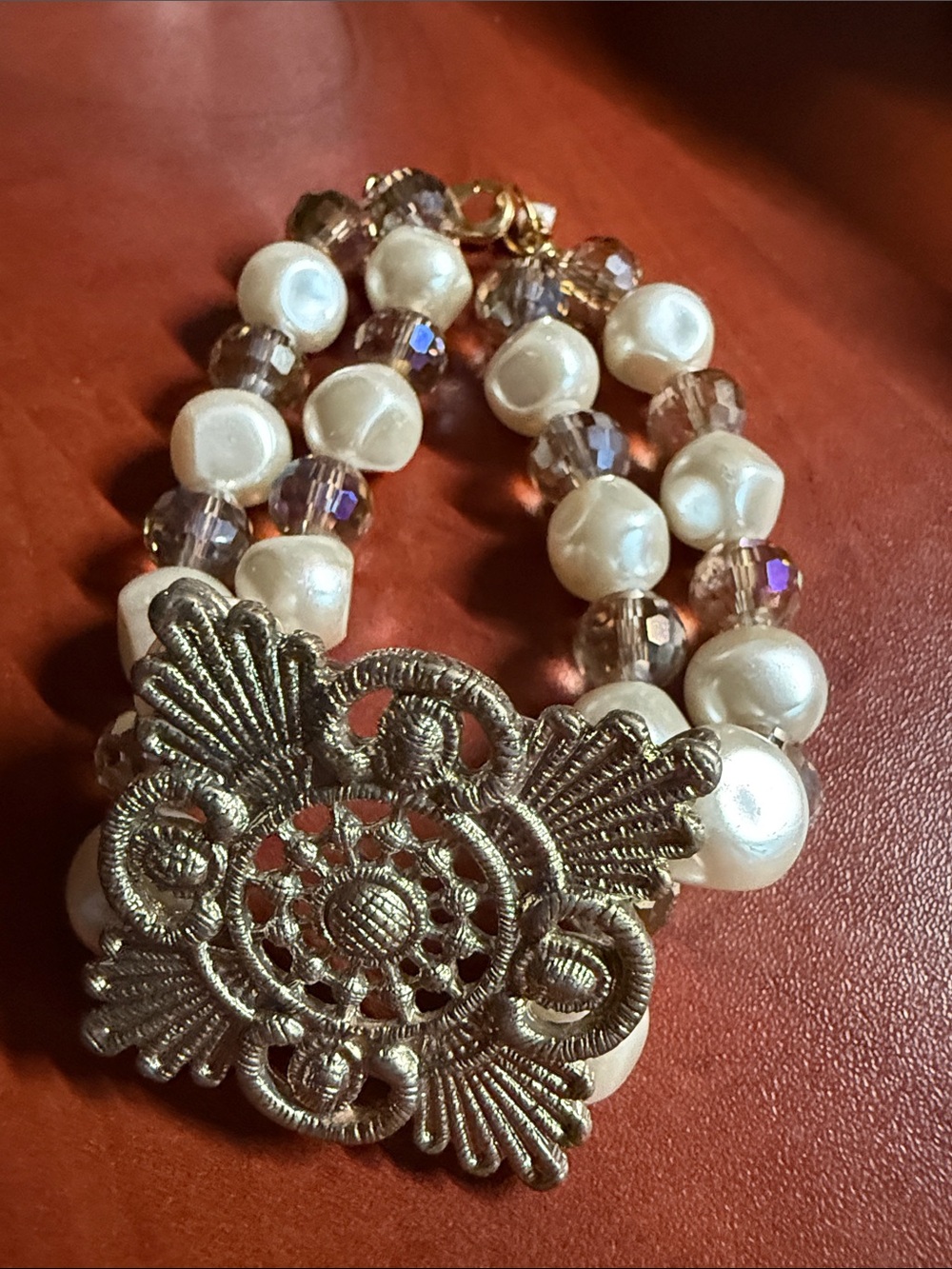 Pearl and iridescent Crystal Double-Strand Bracelet with Gold Filigree Accent
